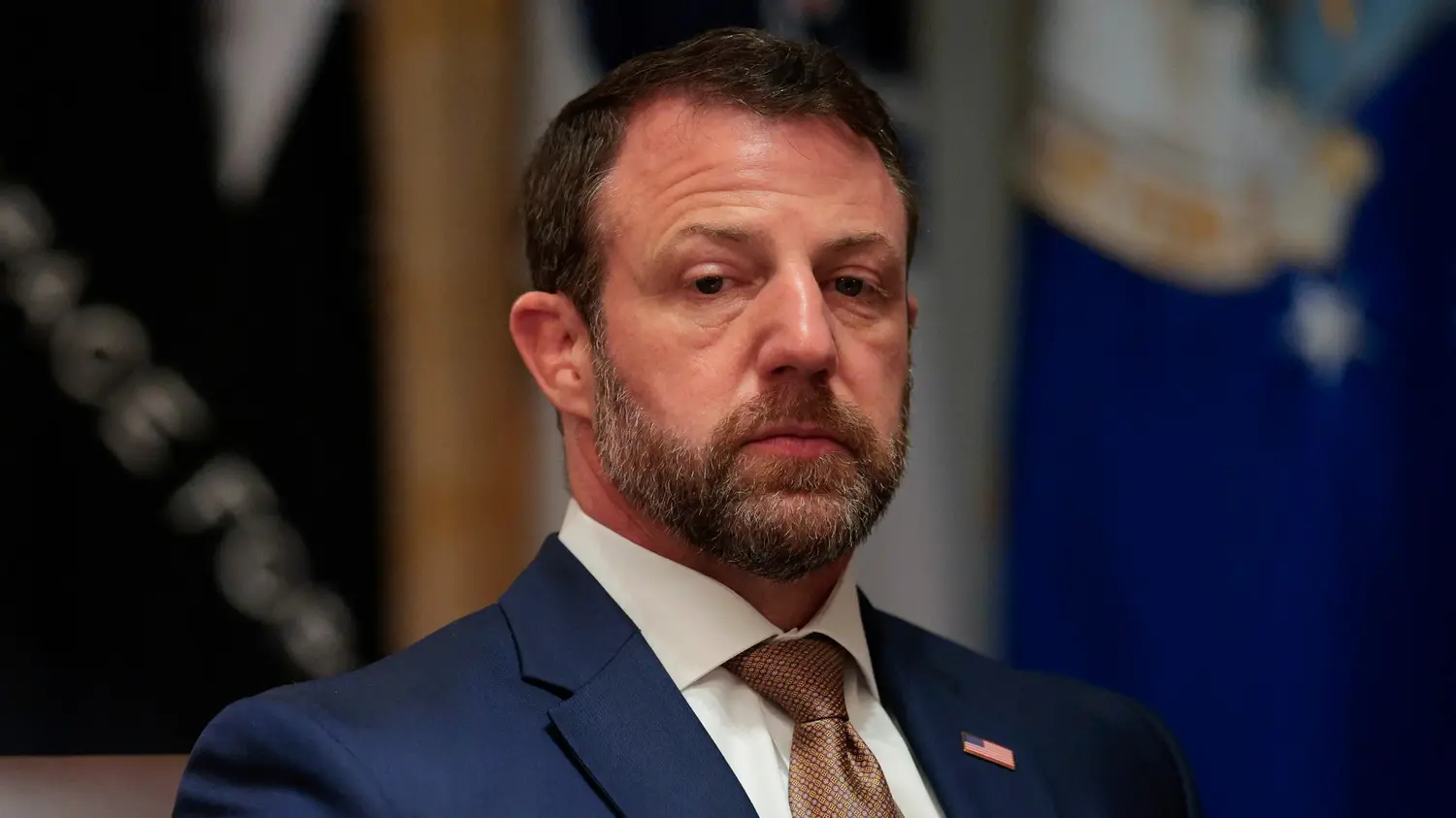 DHS Secretary Markwayne Mullin speaks to reporters as the administration weighs withdrawing customs officers from sanctuary city airports