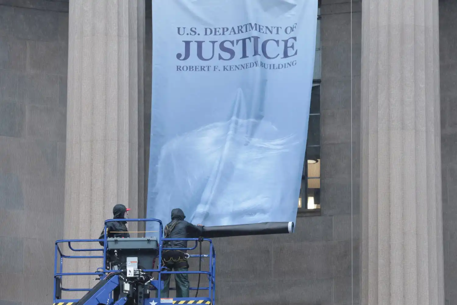 Department of Justice seal and building exterior representing the DOJ's new unified corporate enforcement and voluntary disclosure framework announced March 2026
