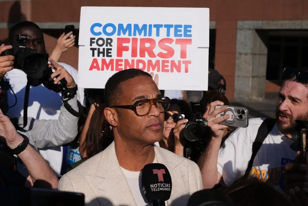 Don Lemon speaking to reporters after federal civil rights charges related to protest coverage