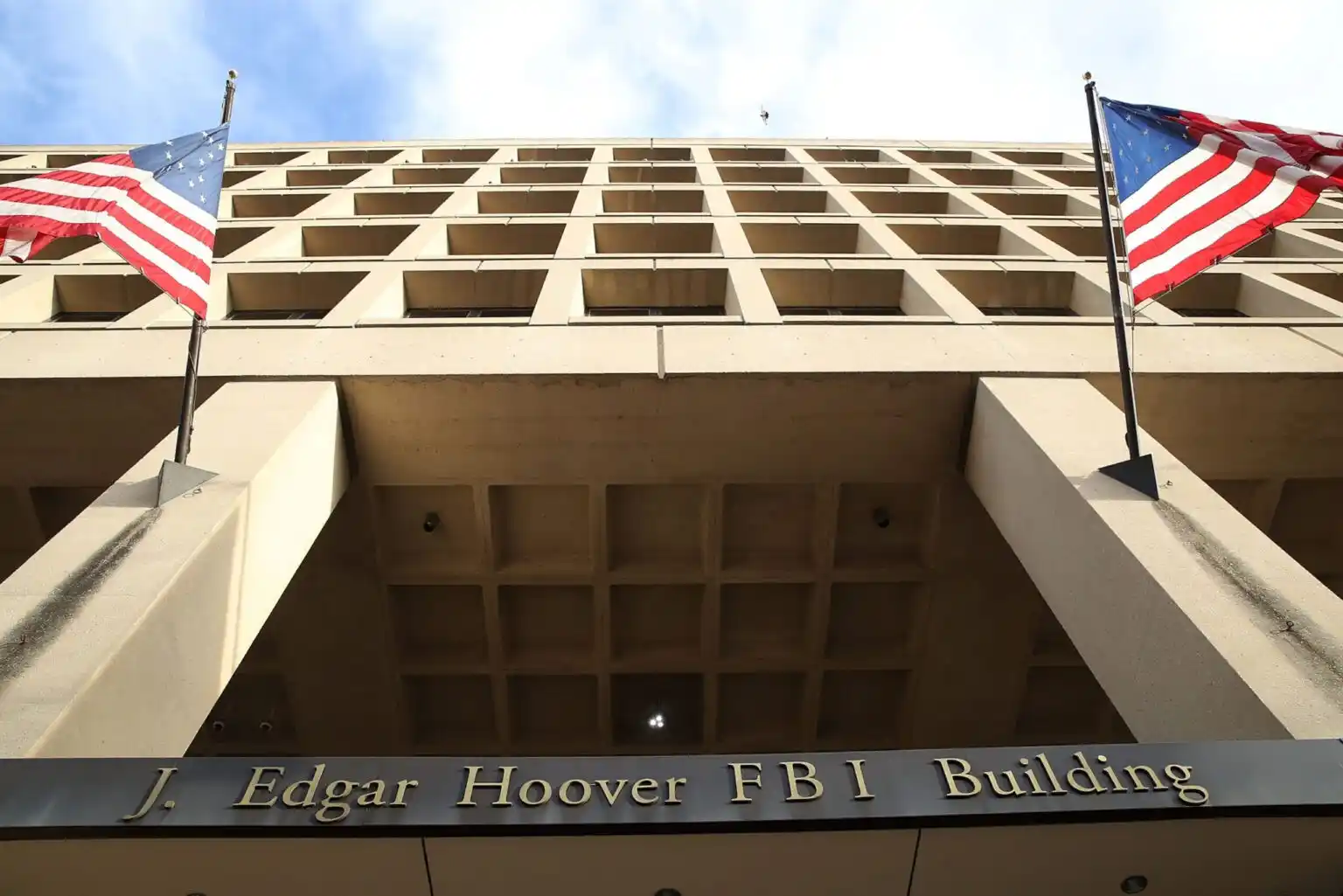 FBI headquarters J. Edgar Hoover Building Washington DC representing the ongoing criminal investigation of former CIA Director Brennan over Russia election interference report