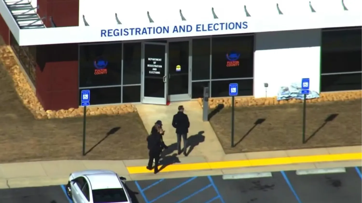 FBI officials loading ballots for the 2020 election into trucks at a Fulton County facility