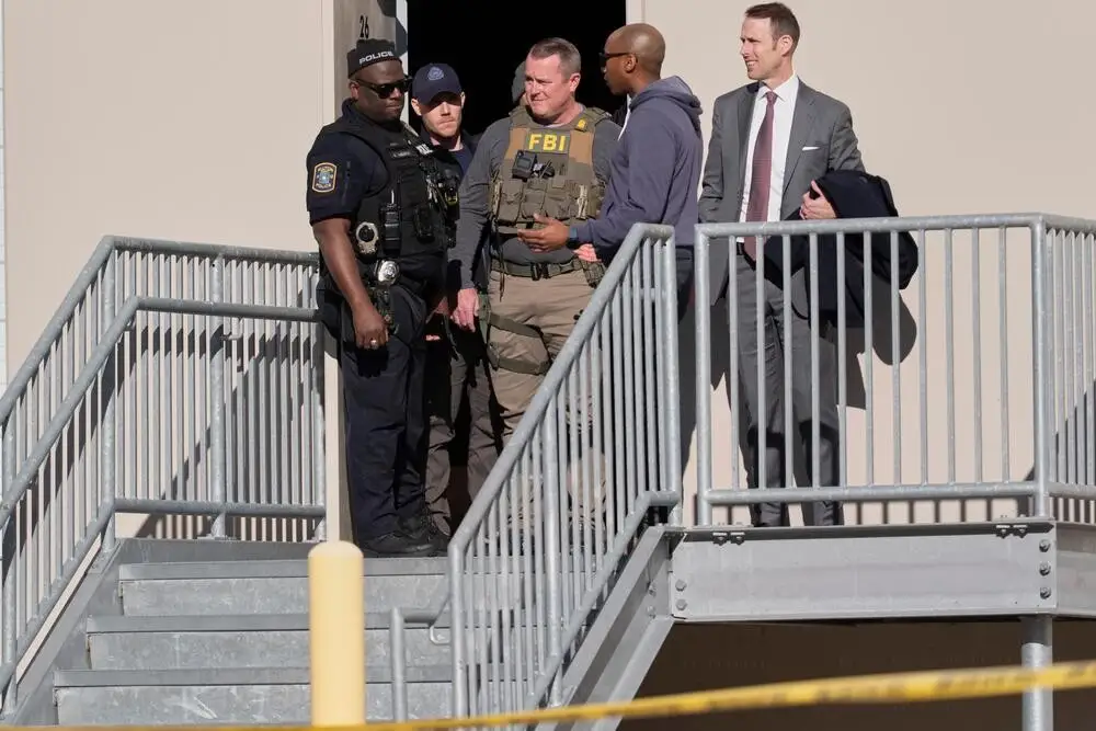 FBI agents at Fulton County Election Hub during search warrant execution