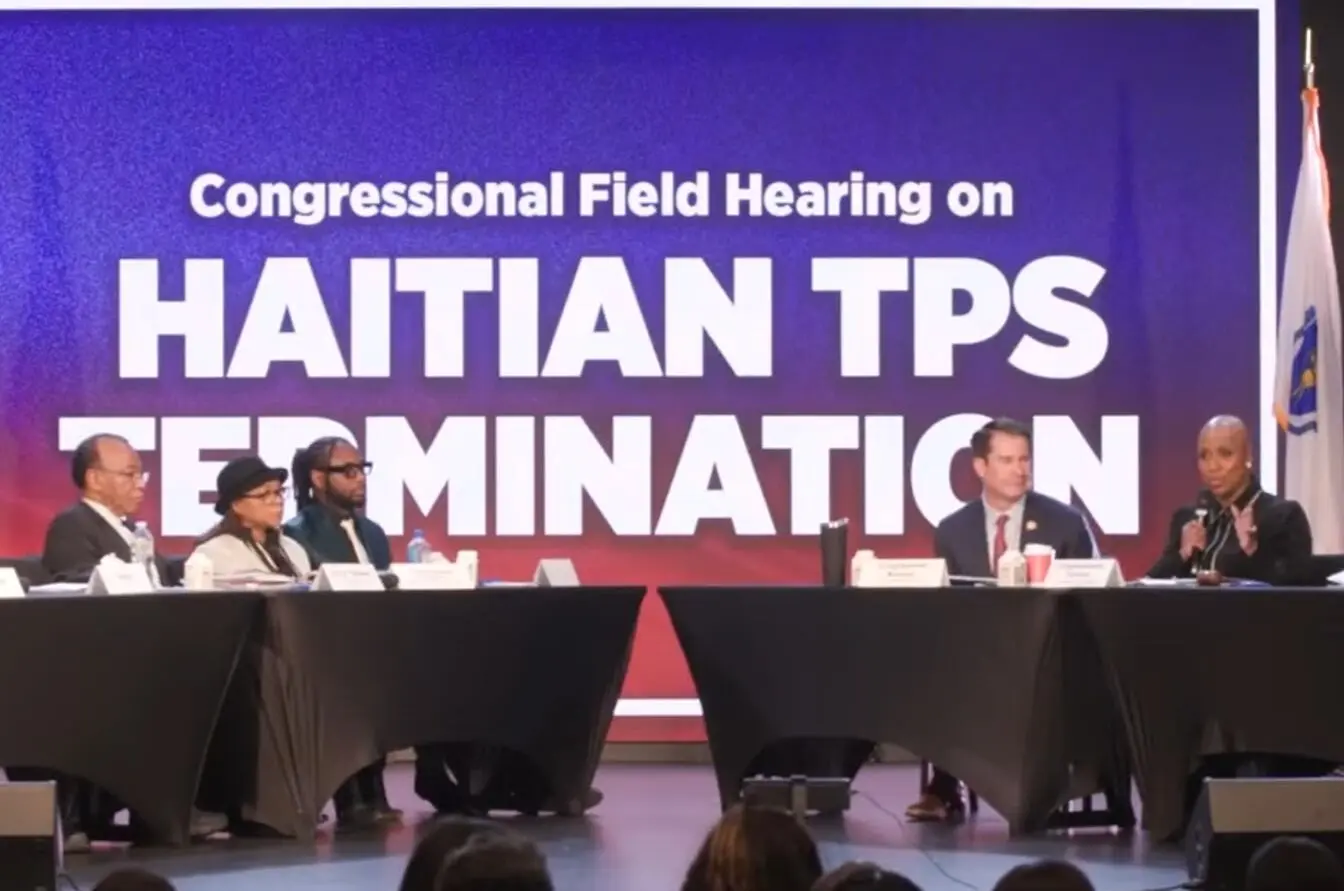 A group of Haitian TPS holders celebrating outside the courthouse