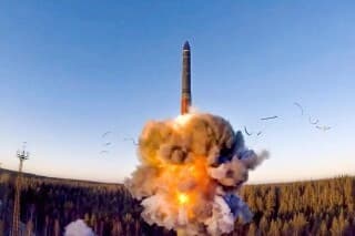Vladimir Putin and Donald Trump shown in split image with nuclear treaty context