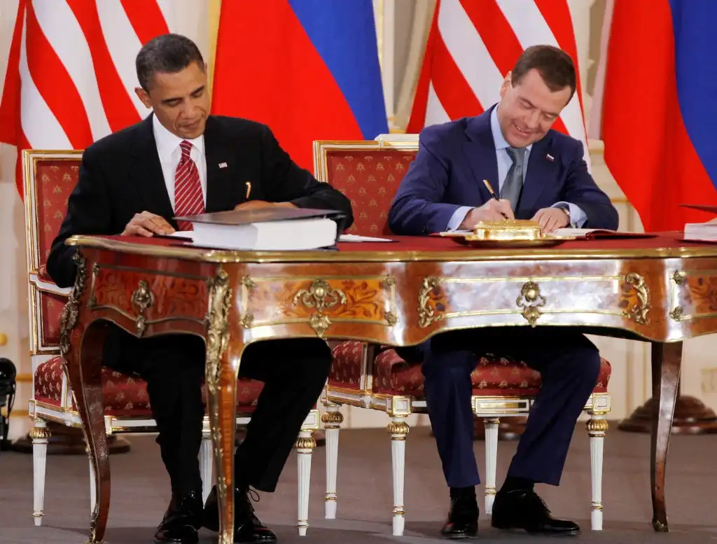Nuclear missile silos with US and Russian flags symbolizing end of New START