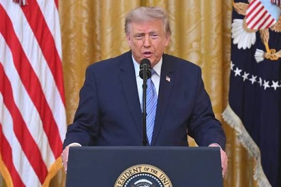 President Trump speaking at a lectern during a primetime address