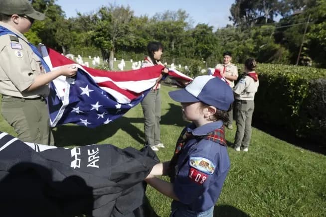Scouting America jamboree event with youth participants and American flags
