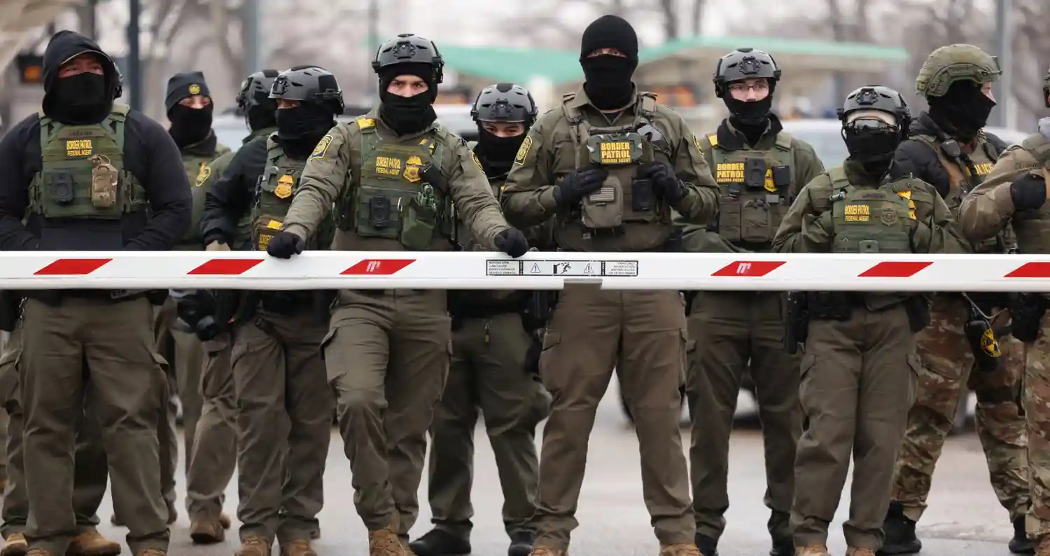 Protesters outside a government building after the Minneapolis shootings