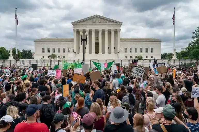 Voting rights advocates gathered outside the U.S. Supreme Court building