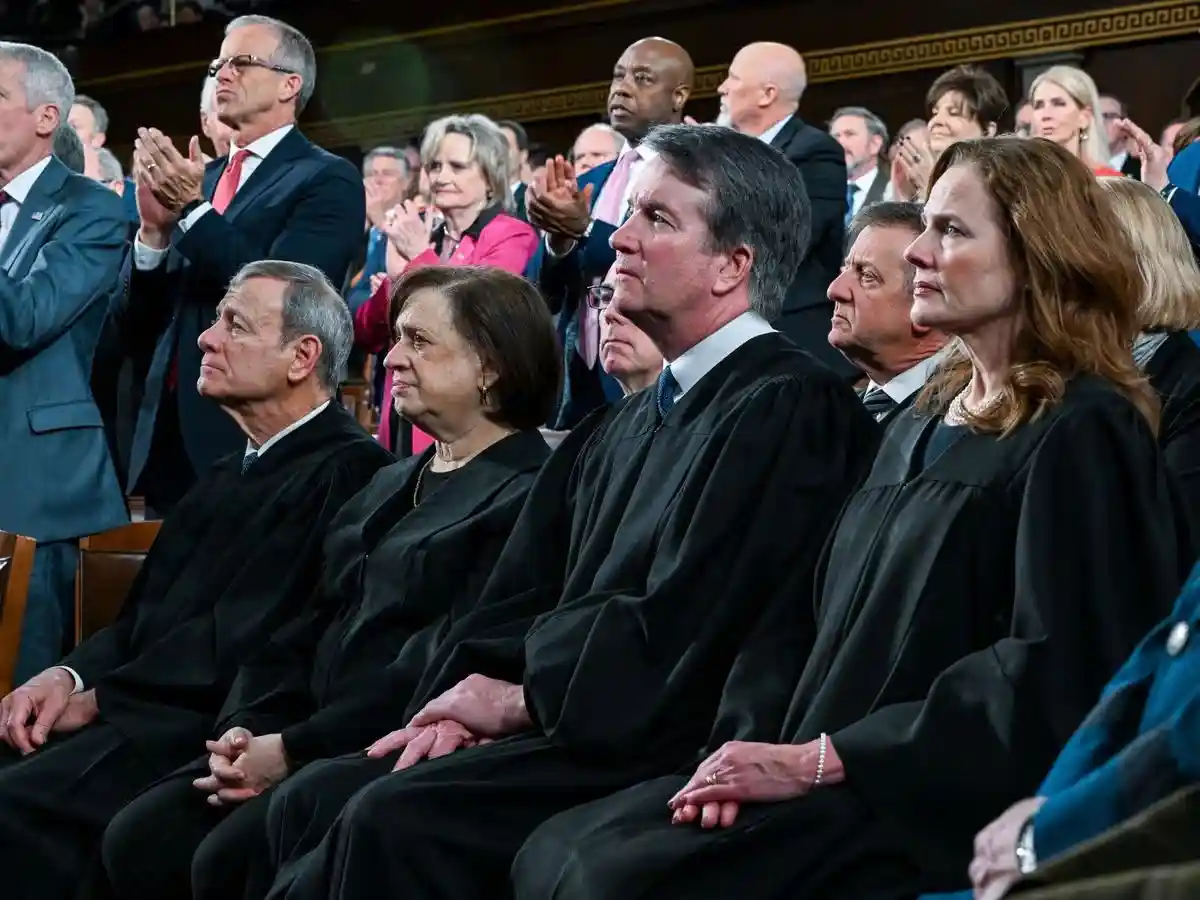 Supreme Court justices in session during tariff case arguments