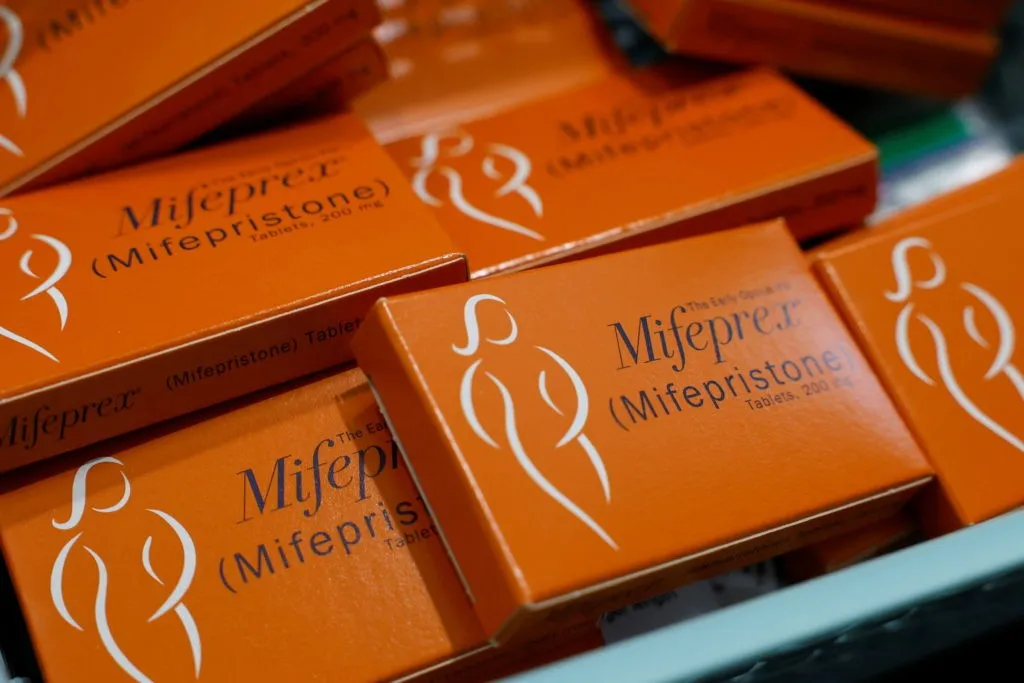 Boxes of mifepristone prepared for mail distribution at a reproductive health clinic