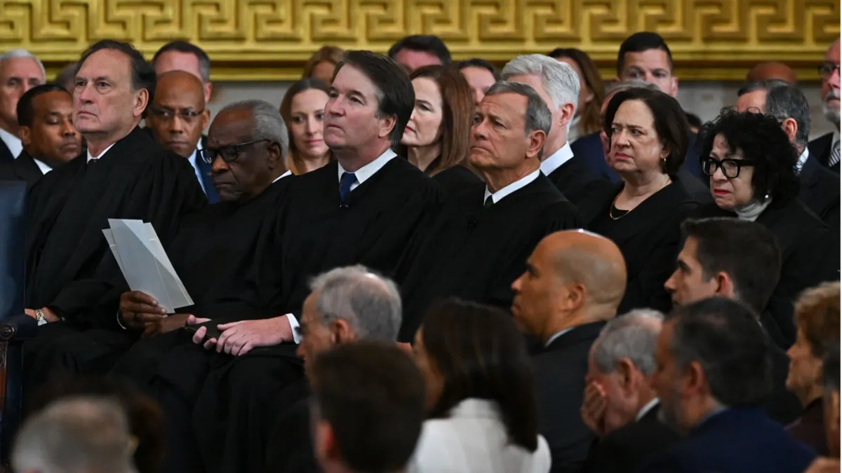 U.S. Supreme Court building in Washington D.C. with American flag