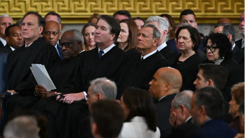 U.S. Supreme Court building in Washington D.C. with American flag