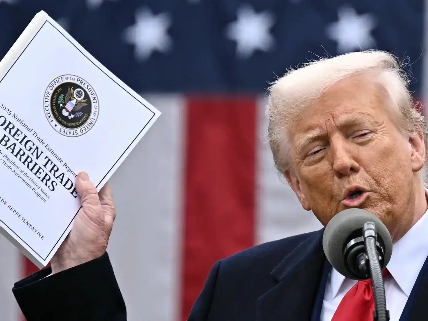 US and Chinese flags alongside trade documents representing ongoing tariff negotiations between Washington and Beijing