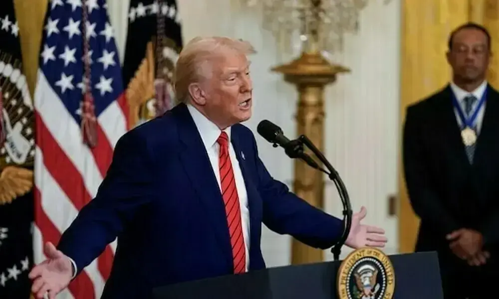 Protest signs against U.S. sanctions outside the International Criminal Court in The Hague
